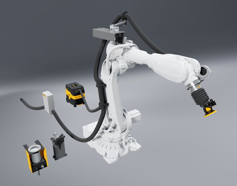 Industrial robot with a Mirka sander, drive cabinet, extractor and disc changer
